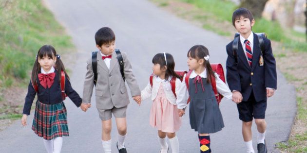 Children in Formal Suit Walking Together, Holding Hands
