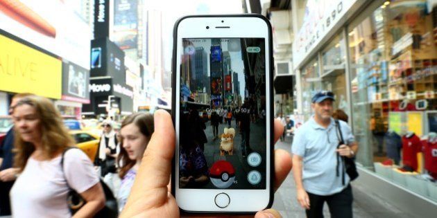 NEW YORK, NY - JULY 13: A Pokemon Go user plays Pokemon GO game in New York City, NY on July 13, 2016. Pokemon Go is a free-to-play location-based augmented reality mobile game which allows players to capture, battle, and train virtual Pokemon who appear throughout the real world. Pokemon Go was rolled out to iPhone and Android smartphone users in the United States, Australia and New Zealand on July 6. (Photo by Volkan Furuncu/Anadolu Agency/Getty Images)