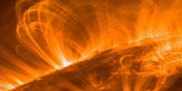 379099 02: The sun's coronal loops are shown in this photo, released September 26, 2000, taken by special instruments on board NASA's Transition Region and Coronal Explorer (TRACE) spacecraft. Fountains of multimillion-degree, electrified gas in the atmosphere of the sun have revealed the location where the solar atmosphere is heated to temperatures 1000-times greater than the sun's visible surface. (Photo by NASA/Newsmakers)