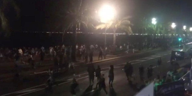 In this UGC video grab provided by Harp Detective on Thursday July 14, 2016, people run out from the scene after a truck drove on to the sidewalk and plowed through a crowd of revelers whoâd gathered to watch the fireworks in the French resort city of Nice. Officials and eyewitnesses described as a deliberate attack. There appeared to be many casualties. (Harp Detective via AP)