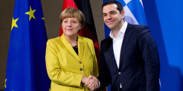 BERLIN, GERMANY - MARCH 23: German Chancellor Angela Merkel and Greek Prime Minister Alexis Tsipras depart after speaking to the media following talks at the Chancellery on March 23, 2015 in Berlin, Germany. The two leaders are meeting as relations between the Tsipras government and Germany have soured amidst contrary views between the two countries on how Greece can best work itself out of its current economic morass. (Photo by Carsten Koall/Getty Images)