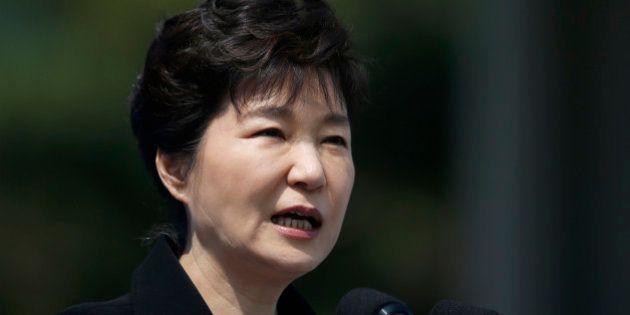 South Korean President Park Geun-hye delivers a speech during a ceremony marking Memorial Day at the National Cemetery in Seoul, South Korea, Saturday, June 6, 2015. South Korea marked the 60th anniversary of Memorial Day for those killed in the 1950-53 Korean War. (Kim Hong-Ji/Pool Photo via AP)