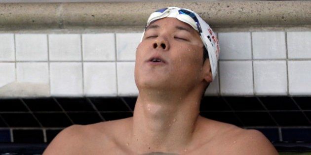 Park Taehwan, of South Korea, reacts after winning the 400-meter freestyle final at the Santa Clara International Grand Prix, Friday, June 1, 2012, in Santa Clara, Calif. (AP Photo/Marcio Jose Sanchez)