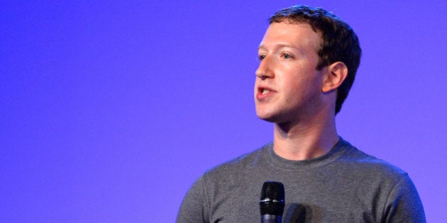 NEW DELHI, INDIA - OCTOBER 9: Co-founder and chief executive of Facebook Mark Zuckerberg gestures as he announces the Internet.org Innovation Challenge in India on October 9, 2014 in New Delhi, India. Zuckerberg is on a two-day visit to India aimed at promoting the internet.org app, which allows people in underdeveloped areas to access basic online services. (Photo by Arun Sharma/Hindustan Times via Getty Images)