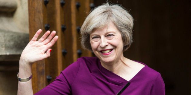 LONDON, ENGLAND - JULY 07: British Home Secretary and Conservative leadership contender Theresa May waves outside the Houses of Parliament on July 7, 2016 in London, England. Theresa May has the backing of 199 fellow MPs after the second ballot for the leadership of the Conservative Party. Receiving 84 votes, Andrea Leadsom MP joins May on the shortlist presented to the Conservative Party members and Michael Gove was eliminated with 46 votes. (Photo by Jack Taylor/Getty Images)