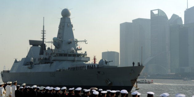 SHANGHAI, CHINA - DECEMBER 10: (CHINA OUT) Chinese navy officers stand in line as the British Royal Navy destroyer HMS Daring arrives at Shanghai Port International Cruise Terminal on December 10, 2013 in Shanghai, China. The HMS Daring kicked off a four-day visit to China for the first time, after helping victims of Typhoon Haiyan in the Philippines. (Photo by ChinaFotoPress/ChinaFotoPress via Getty Images)