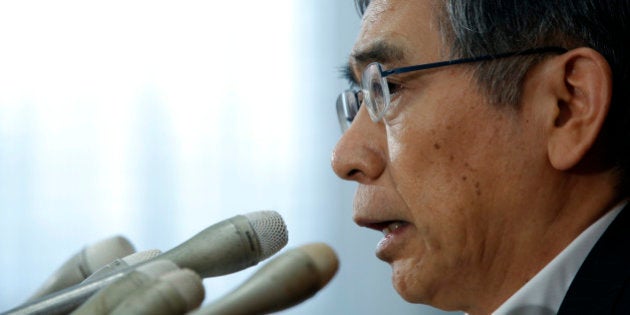 Haruhiko Kuroda, governor of the Bank of Japan (BOJ), speaks during a news conference at the central bank's headquarters in Tokyo, Japan, on Thursday, Aug. 8, 2013. Kuroda warned against a delay in the nation's planned sales-tax increase, while pledging that the central bank will take action should its two-year, 2 percent inflation target be endangered. Photographer: Kiyoshi Ota/Bloomberg via Getty Images