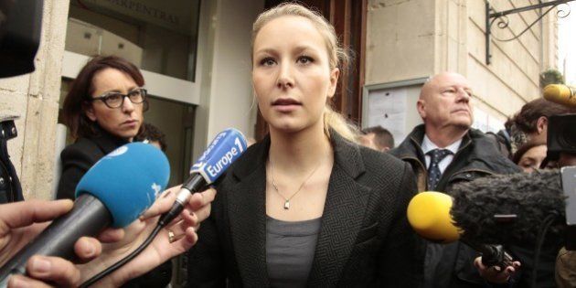 CARPENTRAS, FRANCE - DECEMBER 06: Marion Marechal-Le Pen vice President of the French far-right Front National (FN) party and candidate for the regional elections in the Provence-Alpes-Cote d'Azur (PACA) region speaks to the press as she leaves a polling station on December 6, 2015 in Carpentras, France. Voting is under way in France's regional elections, which are being held under a continued state of emergency following the Paris terror attacks. (Photo by Patrick Aventurier/Getty Images)