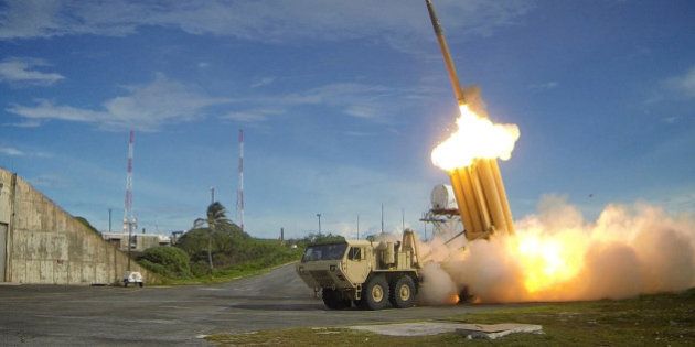 A Terminal High Altitude Area Defense (THAAD) interceptor is launched during a successful intercept test,...