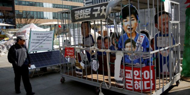 A cutout of South Korea's ousted leader Park Geun-hye is displayed inside a mock jail in Seoul, South Korea, March 13, 2017. REUTERS/Kim Kyung-Hoon