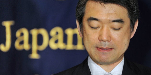 Osaka Mayor Toru Hashimoto pauses as he speaks during a press conference at the Foreign Correspondents' Club of Japan in Tokyo on May 27, 2013. Hashimoto recently drew fire by saying that women forced to provide sex to Japanese troops during World War II were a military necessity. Opinion polls show that a large majority of Japanese disagree with the mayor's remarks on the so-called 'comfort women'. AFP PHOTO / KAZUHIRO NOGI (Photo credit should read KAZUHIRO NOGI/AFP/Getty Images)