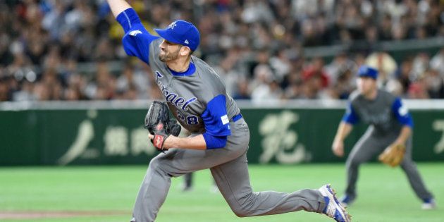 Israeli starter Josh Zeid pitches the ball in the bottom of the first inning during the World Baseball Classic Pool E second round match between Israel and Japan at Tokyo Dome in Tokyo on March 15, 2017. / AFP PHOTO / TORU YAMANAKA (Photo credit should read TORU YAMANAKA/AFP/Getty Images)