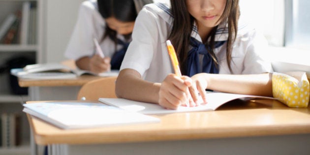 Girl students taking lessons