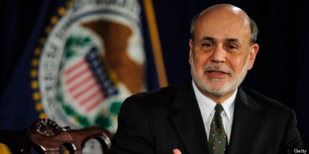 Ben S. Bernanke, chairman of the U.S. Federal Reserve, speaks at a news conference following the Federal Open Market Committee meeting in Washington, D.C., U.S., on Wednesday, June 19, 2013. The Federal Reserve may 'moderate' its pace of bond purchases later this year and may end them around mid-2014, Bernanke said. Photographer: Pete Marovich/Bloomberg via Getty Images