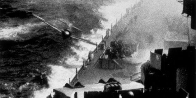 A Japanese kamikaze pilot tries to crash his plane loaded with bombs onto the deck of a US Pacific Fleet warship. (Photo by Keystone/Getty Images)