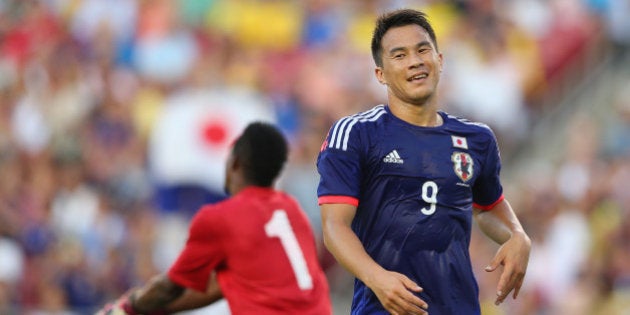 CLEARWATER, FL - JUNE 06: Shinji Okazaki of Japan reacts after a missed chance during the International Friendly Match between Japan and Zambia at Raymond James Stadium on June 6, 2014 in Clearwater, Florida. (Photo by Mark Kolbe/Getty Images)