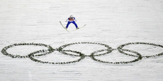 SOCHI, RUSSIA - FEBRUARY 14: Daiki Ito of Japan jumps during the Men's Large Hill Individual Qualification on day 7 of the Sochi 2014 Winter Olympics at the RusSki Gorki Ski Jumping Center on February 14, 2014 in Sochi, Russia. (Photo by Lars Baron/Getty Images)