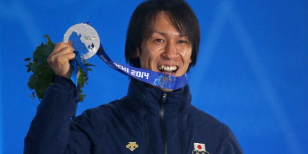 SOCHI, RUSSIA - FEBRUARY 16: Silver medalist Noriaki Kasai of Japan celebrates on the podium during the medal ceremony for the Mens Large Hill Individual on day 9 of the Sochi 2014 Winter Olympics at Medals Plaza on February 16, 2014 in Sochi, Russia. (Photo by Quinn Rooney/Getty Images)