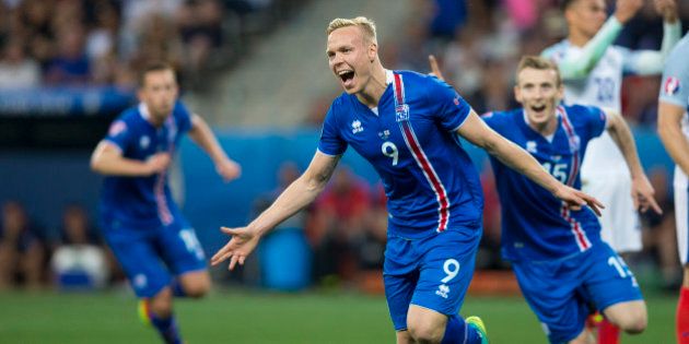 NICE, FRANCE - JUNE 25: Iceland's Kolbeinn Sigthorsson celebrates scoring his sides second goal during the UEFA Euro 2016 Round of 16 match between England and Iceland at Allianz Riviera Stadium on June 27 in Nice, France. (Photo by Craig Mercer/CameraSport via Getty Images)