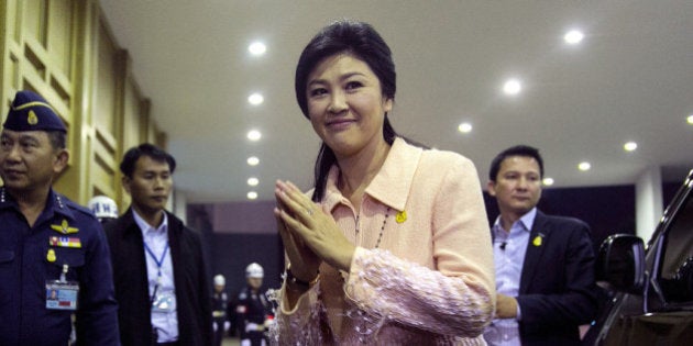 BANGKOK, THAILAND - JANUARY 21: Caretaker Prime Minister of Thailand Yingluck Shinawatra speaks to the media after a meeting with her cabinet amid continuing anti-government protests on January 21, 2014 in Bangkok, Thailand. Starting tomorrow, the Thai government will impose a 60-day state of emergency in Bangkok and the surrounding provinces, in an attempt to cope with the on-going political turmoil. (Photo by Paula Bronstein/Getty Images)