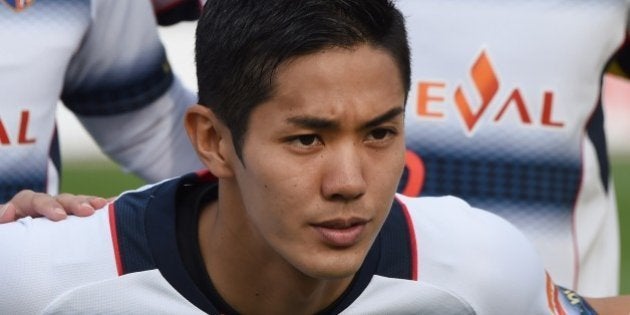 FC Tokyo forward Yoshinori Muto poses for photographers before a J-League football match against Shonan Bellmare in Hiratsuka, Kanagawa prefecture, on April 12, 2015. English Premier League leaders Chelsea have made a formal offer for the 22-year-old Japanese striker Muto, his club FC Tokyo said recently. AFP PHOTO / Toru YAMANAKA (Photo credit should read TORU YAMANAKA/AFP/Getty Images)