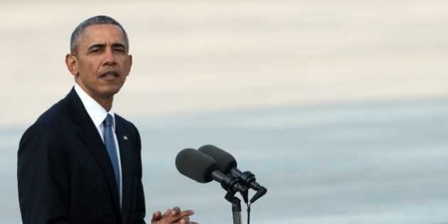 US President Barack Obama delivers a speech at the Hiroshima Peace Memorial park cenotaph in Hiroshima on May 27, 2016.Obama became the first sitting US leader to visit the site that ushered in the age of nuclear conflict. / AFP / JOHANNES EISELE (Photo credit should read JOHANNES EISELE/AFP/Getty Images)