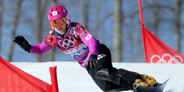 SOCHI, RUSSIA - FEBRUARY 22: Tomoka Takeuchi of Japan competes in the Snowboard Ladies' Parallel Slalom...