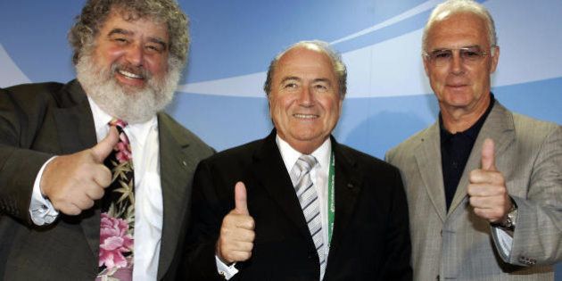 FRANKFURT/MAIN, Germany: FIFA President Joseph Blatter (C), Chairman of the Organising Committee for the FIFA 2006 World Cup Franz Beckenbauer (R) and Chairman of the Organising Committee for the FIFA 2005 Confederations Cup Chuck Blazer pose in Frankfurt 27 June 2005 during a press conference where they presented a statistical wrap-up after the football tournament's semi-finals. Argentina and Brazil will fight out the competition's final on 29 June 2005 in Frankfurt. AFP PHOTO TORSTEN SILZ (Photo credit should read TORSTEN SILZ/AFP/Getty Images)