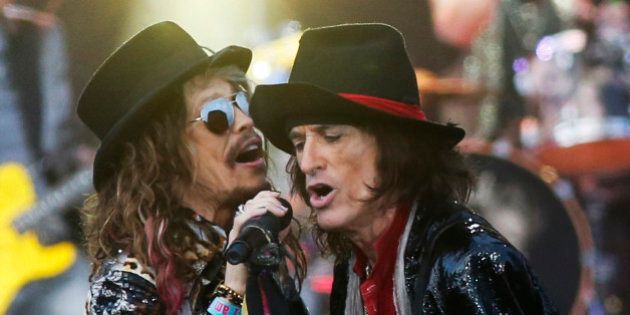 Steven Tyler, left, and Joe Perry of US band Aerosmith perform at the Calling festival in London, Saturday, June 28, 2014. Thousands of music fans are expected at the weekend's festival to see acts such as Aerosmith and Stevie Wonder. (Photo by Jim Ross/Invision/AP)