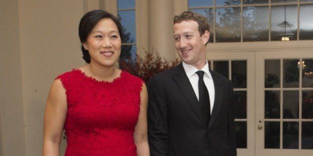 Mark Zuckerberg, Chairman and CEO of Facebook and his wife, Priscilla Chan, arrive for a State Dinner hosted by US President Barack Obama for Chinese President Xi Jinping at the White House in Washington, DC, September 25, 2015. AFP PHOTO / MOLLY RILEY (Photo credit should read MOLLY RILEY/AFP/Getty Images)