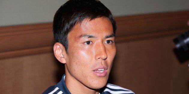 CLEARWATER, FL - MAY 30: Makoto Hasebe of Japan speaks to the press during a media session at the Hyatt Regency Clearwater Beach Resort and Spa on May 30, 2014 in Clearwater, Florida. (Photo by Mark Kolbe/Getty Images)