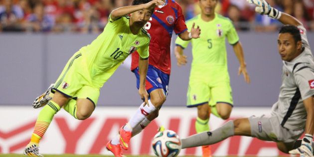 TAMPA, FL - JUNE 02: Shinji Kagawa of Japan scores a goal during the International Friendly Match between Japan and Costa Rica at Raymond James Stadium on June 2, 2014 in Tampa, Florida. (Photo by Mark Kolbe/Getty Images)