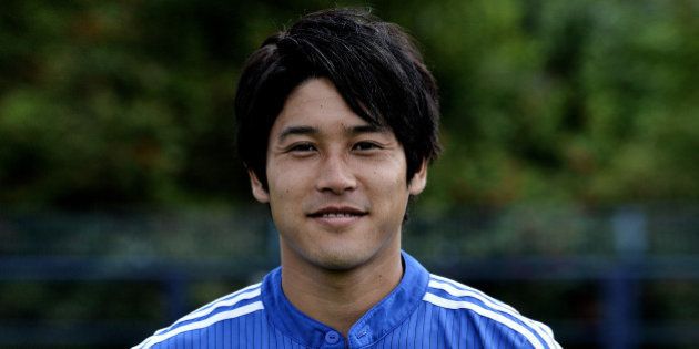 GELSENKIRCHEN, GERMANY - JULY 17: Atsuto Uchida poses during FC Schalke 04 team presentation at Veltins-Arena on July 17, 2014 in Gelsenkirchen, Germany. (Photo by Sascha Steinbach/Bongarts/Getty Images)