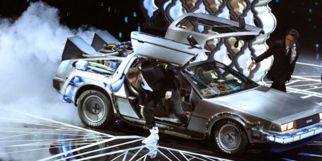 89th Academy Awards - Oscars Awards Show - Seth Rogan and Michael J. Fox arrive onstage in a DeLorean to present the award for Best Film Editing. REUTERS/Lucy Nicholson