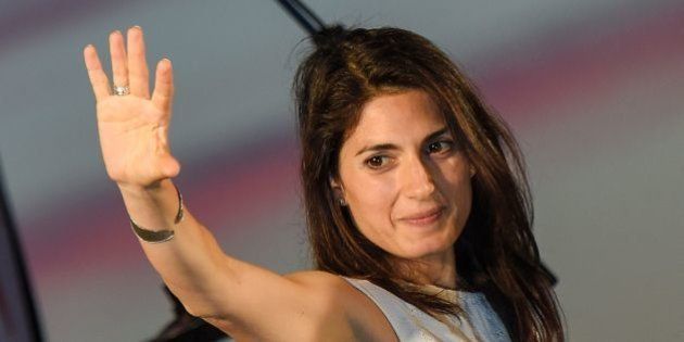 Virginia Raggi, Five Star Movement (M5S) candidate for the mayoral elections in Rome, speaks during her last campaign meeting on June 17, 2016 at Ostia Lido, Rome's seashore, before the second round of the election. Voters in the Italian capital return to the polls on June 19, 2016 for the second round of the mayoral elections opposing candidates Virginia Raggi, Five Star Movement (M5S) and Democratic Party (PD) Roberto Giachetti. / AFP / ANDREAS SOLARO (Photo credit should read ANDREAS SOLARO/AFP/Getty Images)