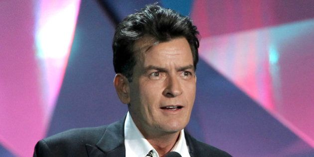 FILE - This June 3, 2012 file photo shows actor Charlie Sheen at the MTV Movie Awards in Los Angeles. In an interview Tuesday, July 17, on Ryan Seacrest's radio show, Sheen said âAmerican Idolâ producer Nigel Lythgoe publicly threw his name out there as a possible judge and the idea peaked his interest. Sheen told Jay Leno Monday night on âThe Tonight Showâ that his two demands would be that FX and his âAnger Managementâ team âwould have to be into itâ and there would need to be a charitable component to him taking the job. (Photo by Matt Sayles/Invision/AP, file)