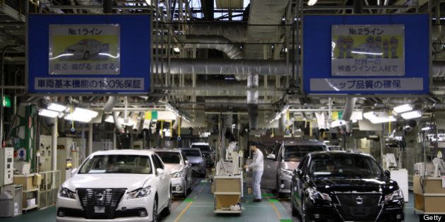 Toyota Motor Corp. Crown sedans undergo inspection at the company's Motomachi plant in Toyota City, Aichi Prefecture, Japan, on Thursday, Jan. 17, 2013. Toyota probably has regained its spot as the world's top-selling automaker after losing it in 2011 following disasters in Asia that hurt its ability to make cars and trucks. Photographer: Tomohiro Ohsumi/Bloomberg via Getty Images