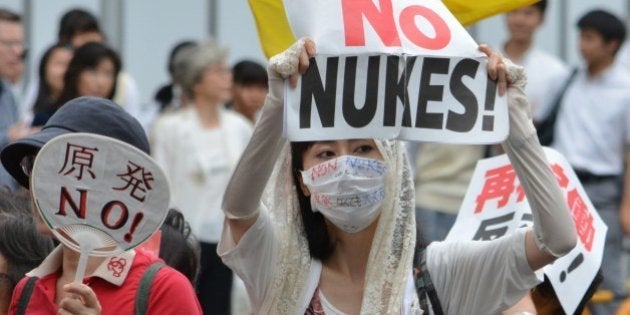 Protesters stage a demonstration march in Tokyo on June 28, 2014 against re-opening the Sendai nuclear power plant operated by Kyushu Electric Power Company. About 5,500 protesters participated in the anti-nuclear power plant rally. AFP PHOTO / KAZUHIRO NOGI (Photo credit should read KAZUHIRO NOGI/AFP/Getty Images)