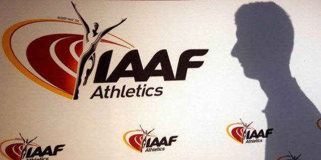 A man casts his shadow following a press conference by Sebastian Coe, IAAF's President, as part of the 203nd International Association of Athletics Federations (IAAF) council meeting in Monaco, March 11, 2016. REUTERS/Eric Gaillard/File Photo