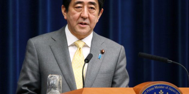 Shinzo Abe, Japan's prime minister, speaks during a news conference at the prime minister's official residence in Tokyo, Japan, on Monday, March 10, 2014. Japan's economy expanded less than estimated in the fourth quarter and the current-account deficit widened to a record in January, highlighting risks to Abenomics as a sales-tax increase looms. Photographer: Haruyoshi Yamaguchi/Bloomberg via Getty Images