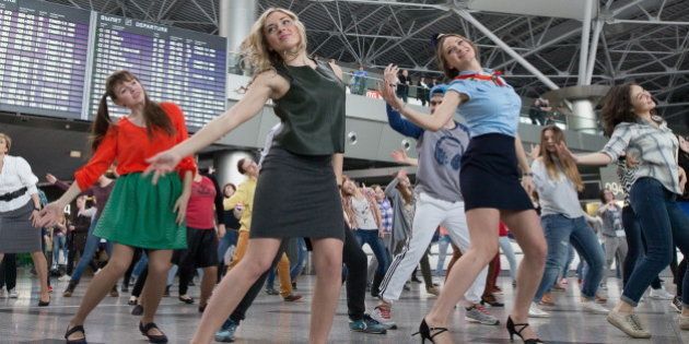 MOSCOW, RUSSIA. FEBRUARY 25, 2016. People participate in a dance flash mob at Moscow's Vnukovo International Airport. Sergei Bobylev/TASS (Photo by Sergei Bobylev\TASS via Getty Images)