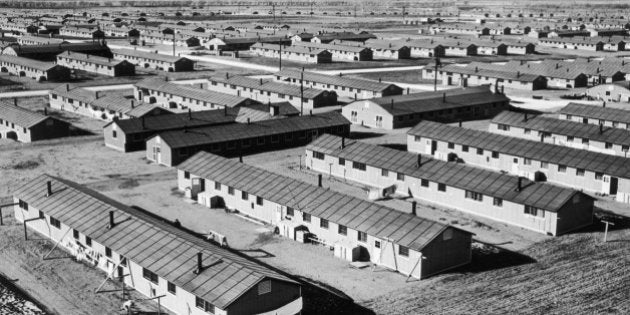 circa 1943: Aerial view of a Japanese-American relocation center in Amache, Colorado, during World War II. It is one of 10 barrack-type cities that were constructed as temporary homes for 110,000 people of Japanese descent who were moved away from the Pacific coast. Each family was provided with a space 20 by 25 ft. The barracks were set in blocks and each block was provided with a community bath house and mess hall. (Photo by Hulton Archive/Getty Images)