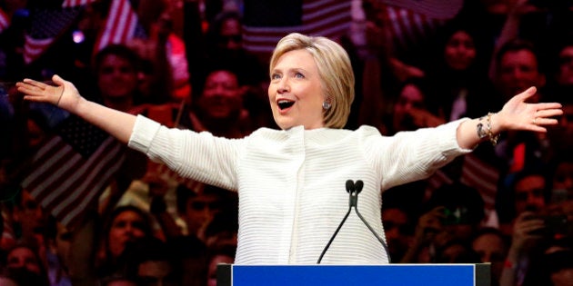 Democratic presidential candidate Hillary Clinton gestures as she greets supporters at a presidential primary election night rally, Tuesday, June 7, 2016, in New York. (AP Photo/Julio Cortez)