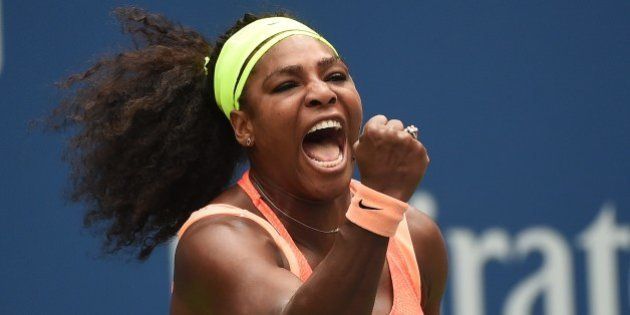 Serena Williams of the US celebrates winning a point against Roberta Vinci of Italy during their 2015 US Open Women's singles semifinals match at the USTA Billie Jean King National Tennis Center in New York on September 11, 2015. AFP PHOTO/JEWEL SAMAD (Photo credit should read JEWEL SAMAD/AFP/Getty Images)