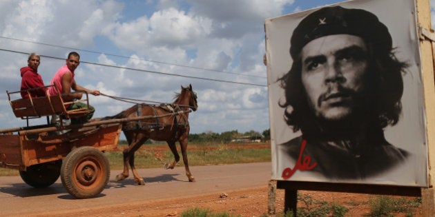 GABRIEL, CUBA - FEBRUARY 28: A poster of Revolutionary hero Che Guevara is seen next to the road a day after the second round of diplomatic talks between the United States and Cuban officials took place in Washington, DC on February 28, 2015 in Gabriel, Cuba. The dialogue is an effort to restore full diplomatic relations and move toward opening trade. (Photo by Joe Raedle/Getty Images)