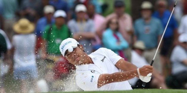 Hideki Matsuyama of Japan hits out of the sand on the 7th hole during Round 4 of the 79th Masters Golf Tournament at Augusta National Golf Club on April 12, 2015, in Augusta, Georgia. AFP PHOTO/DON EMMERT (Photo credit should read DON EMMERT/AFP/Getty Images)