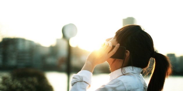 young business woman talking mobile phone