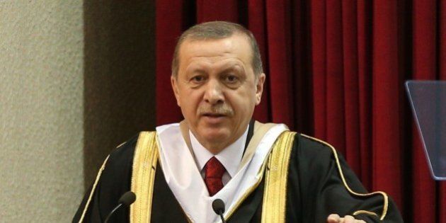 DOHA, QATAR - DECEMBER 02: Turkish President Recep Tayyip Erdogan receives Honorary PHD during a ceremony...
