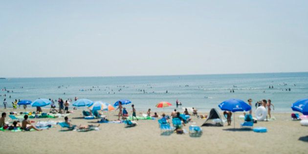 People who bathe in the sea at Yuigahama beach