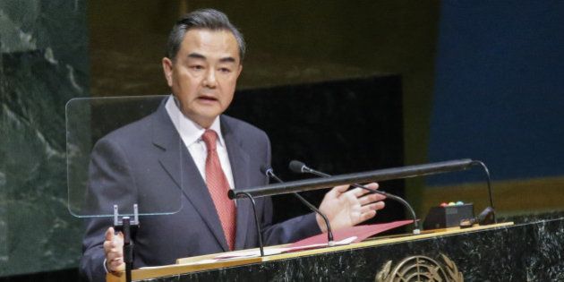 NEW YORK, NY - SEPTEMBER 27: Wang Yi, Minister for Foreign Affairs of China speaks at the 69th United Nations General Assembly on September 27, 2014 in New York City. The annual event brings political leaders from around the globe together to report on issues meet and look for solutions. (Photo by Kena Betancur/Getty Images)